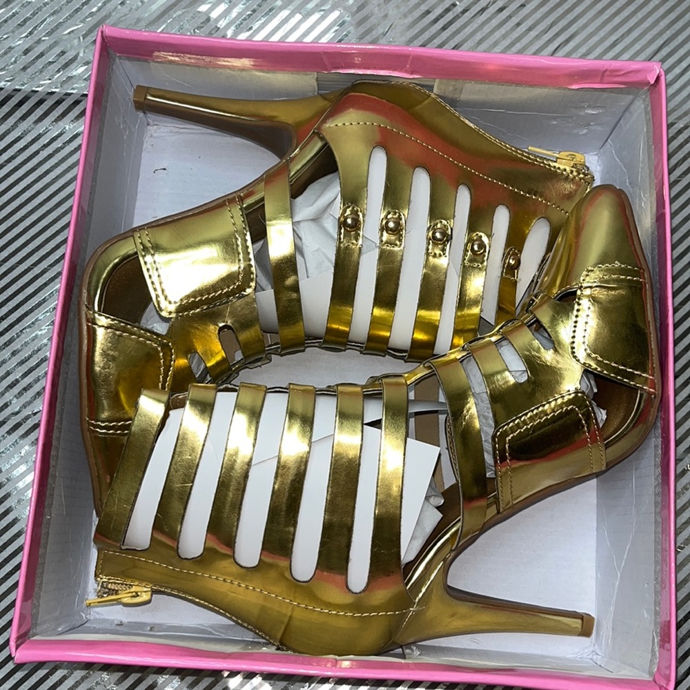 ✨NEW GOLD GLADIATOR BOOTIES✨